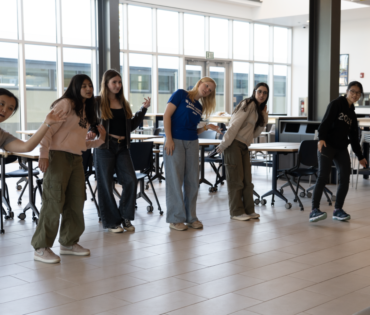 Blue Broadway actors practice in the Student Union for their production of “Xanadu.”